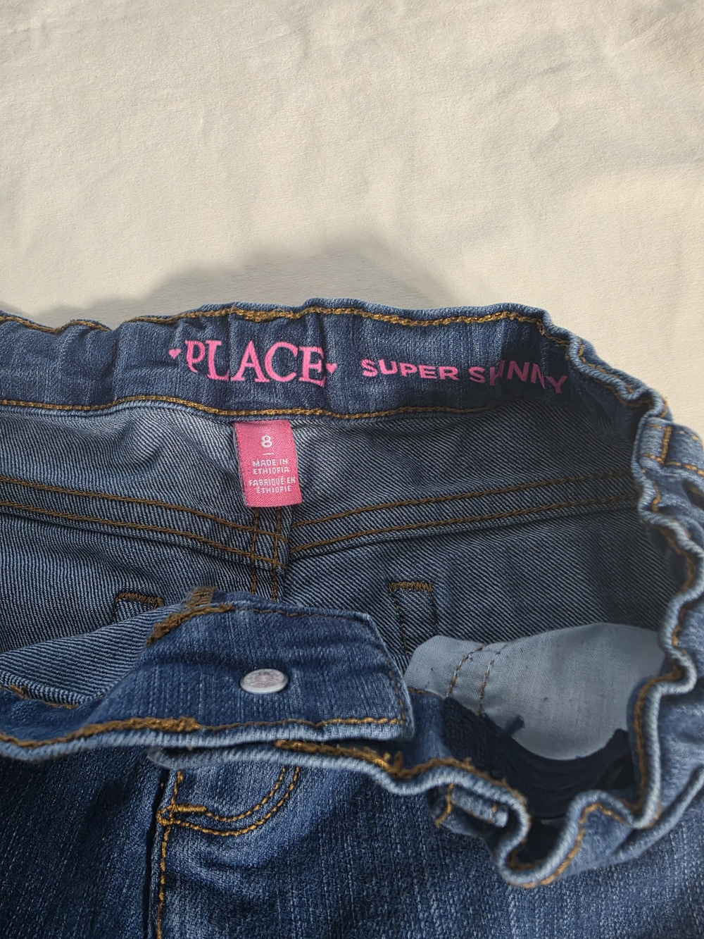 The Children’s Place Super Skinny Girls' Jeans - Blue with Pink Logo